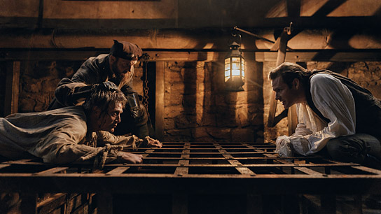 Mads Mikkelsen (vorne links), Simon Bennebjerg (rechts) in "King's Land" (2023) Mads Mikkelsen (vorne links), Simon Bennebjerg (rechts) in "King's Land" (2023)