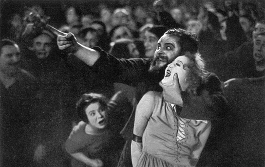 Heinrich George, Brigitte Helm (vorne) in "Metropolis" (1926); Quelle: Murnau-Stiftung, DFF, © Horst von Harbou - Deutsche Kinemathek