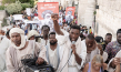 Yvan Sagnet (vorne Mitte) in "Das neue Evangelium" (2020); Quelle: Port au Prince Pictures, DFF, © Fruitmarket LLangfilm, IIPM, Armin Smailovic