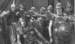 Theodor Becker (sitzend) in "Der Sturz in den Abgrund" (1922)