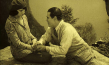 Screenshot mit Annie Gorilowa, Luciano Albertini (v.l.n.r.) aus "Mister Radio" (1924)