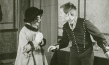 Screenshot mit Rolf Lindau-Schulz (rechts) aus "Spitzenchristel" (1917)