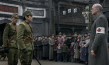 Teruyuki Kagawa (vorne, 2.v.l.), Ulrich Tukur (vorne, rechts) in "John Rabe" (2009)