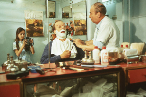 Rüdiger Vogler (Mitte), Canto e Castro (rechts) in "Lisbon Story" (1995)