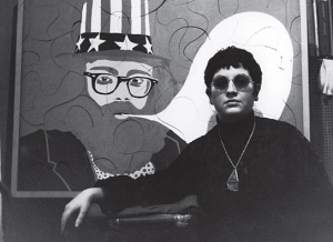 Ulrike Ottinger vor ihrem Bild "Allen Ginsberg", Paris, 1966 ("Paris Calligrammes", 2020); Quelle: Real Fiction Filmverleih, DFF, © privat