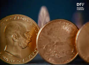 Screenshot aus "BAYERISCHE VEREINSBANK 'Goldmünzen'" (19??); Quelle: DFF