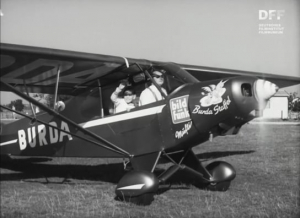 Screenshot aus "Burda (Nr. 4 Flugplatz)" (1960); Quelle: DFF