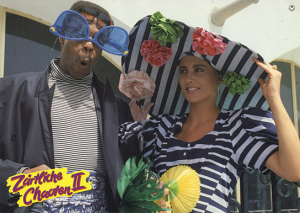 Michael Winslow, Deborah Shelton (v.l.n.r.) in "Zärtliche Chaoten II" (1988); Quelle: DFF