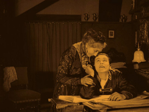 Screenshot mit Agnes Nero, Luciano Albertini (v.l.n.r.) aus "Mister Radio" (1924)