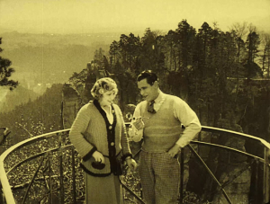 Screenshot mit Evi Eva, Luciano Albertini (v.l.n.r.) aus "Mister Radio" (1924)